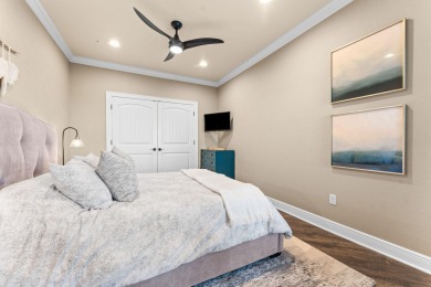 Step into low-maintenance living where the lake is your backdrop