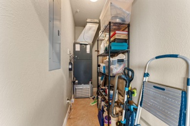 Step into low-maintenance living where the lake is your backdrop