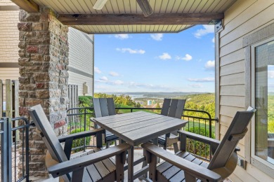 Step into low-maintenance living where the lake is your backdrop