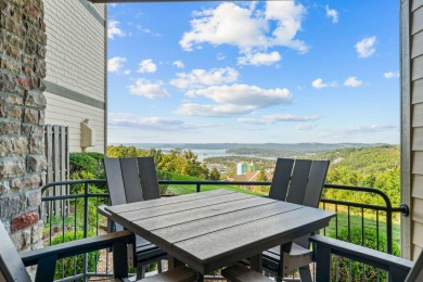 Step into low-maintenance living where the lake is your backdrop