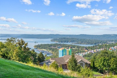 Step into low-maintenance living where the lake is your backdrop