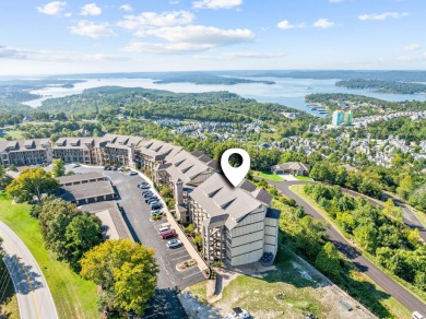 Step into low-maintenance living where the lake is your backdrop