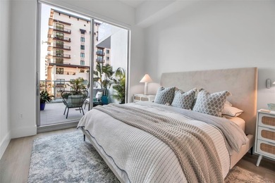 Welcome to the pinnacle of downtown Sarasota living at 301 Quay