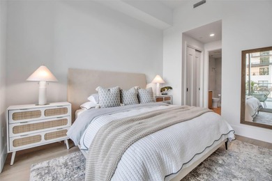 Welcome to the pinnacle of downtown Sarasota living at 301 Quay