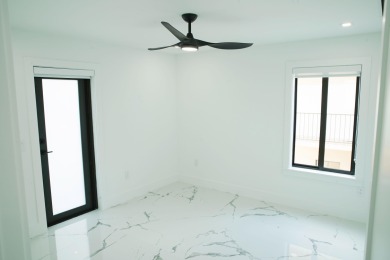 Welcome to your dream coastal retreat! This brand-new modern