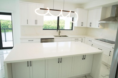 Welcome to your dream coastal retreat! This brand-new modern