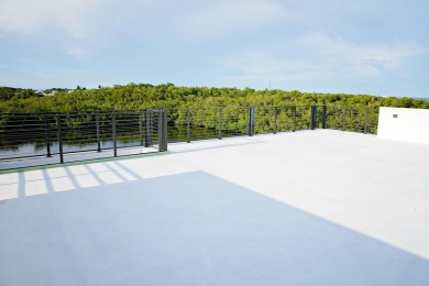 Welcome to your dream coastal retreat! This brand-new modern