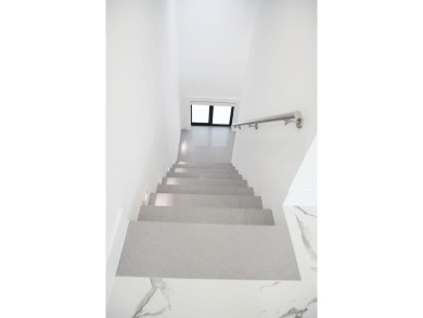 Welcome to your dream coastal retreat! This brand-new modern