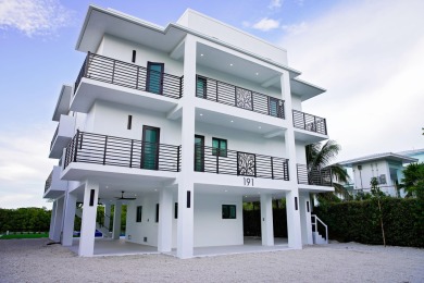 Welcome to your dream coastal retreat! This brand-new modern