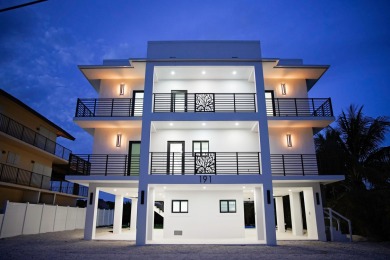 Welcome to your dream coastal retreat! This brand-new modern