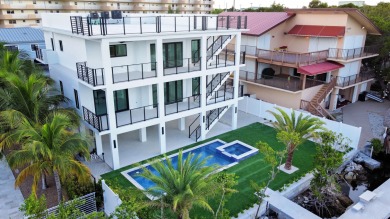 Welcome to your dream coastal retreat! This brand-new modern