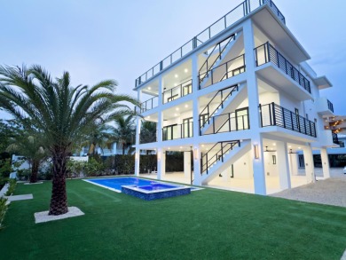 Welcome to your dream coastal retreat! This brand-new modern