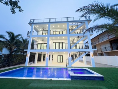 Welcome to your dream coastal retreat! This brand-new modern