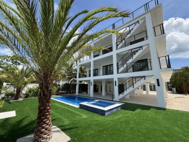 Welcome to your dream coastal retreat! This brand-new modern