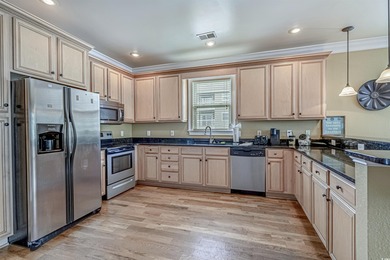 Welcome to your coastal sanctuary at 827-B North Waccamaw Drive