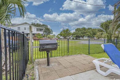 Welcome to your coastal sanctuary at 827-B North Waccamaw Drive