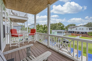 Welcome to your coastal sanctuary at 827-B North Waccamaw Drive