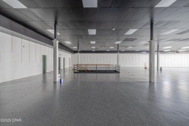 This solidly constructed, three-level commercial building offers