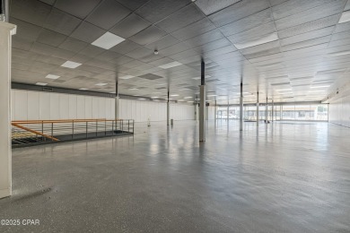 This solidly constructed, three-level commercial building offers