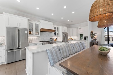 Discover this exquisite custom home on the east end of Scenic