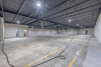 This solidly constructed, three-level commercial building offers