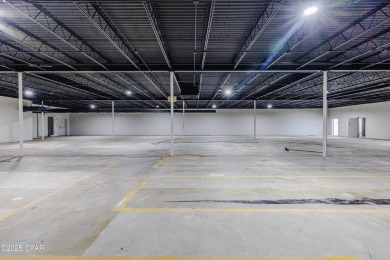 This solidly constructed, three-level commercial building offers