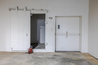 This solidly constructed, three-level commercial building offers