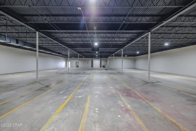 This solidly constructed, three-level commercial building offers