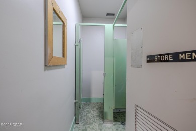 This solidly constructed, three-level commercial building offers