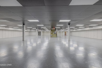 This solidly constructed, three-level commercial building offers