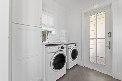 Discover this exquisite custom home on the east end of Scenic