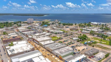 This solidly constructed, three-level commercial building offers