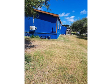 Located on 5 lovely cared for acres, this is a double wide