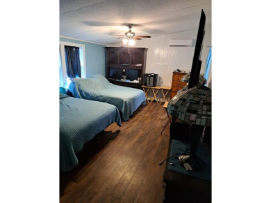 Located on 5 lovely cared for acres, this is a double wide