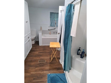 Located on 5 lovely cared for acres, this is a double wide