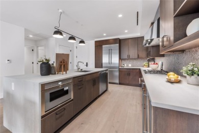 This desirable 2-bedroom, 2-bath residence boasts a coveted