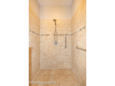 Discover this stunning, concrete block home in a quiet secure