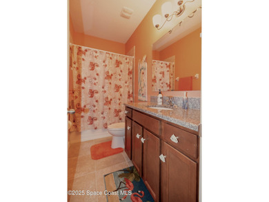 Discover this stunning, concrete block home in a quiet secure