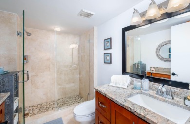 Professionally remodeled and fully furnished, this stunning unit