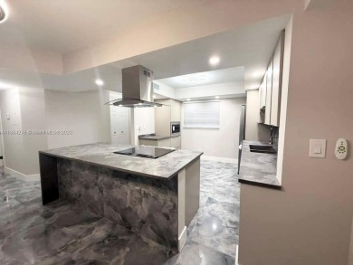 STUNNING HOME IN THE HEART OF TAMARAC. NEW ROOF NEW ELEVATOR ALL