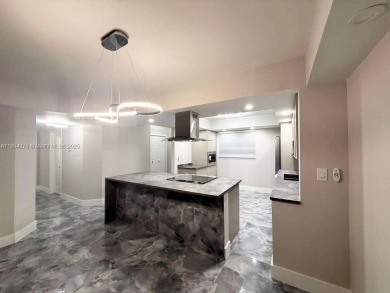 STUNNING HOME IN THE HEART OF TAMARAC. NEW ROOF NEW ELEVATOR ALL