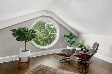 Penthouse chic welcomes you in this elegant, sparkling top floor