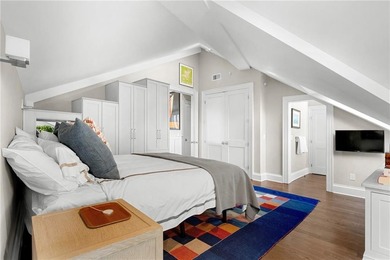 Penthouse chic welcomes you in this elegant, sparkling top floor