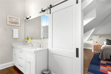 Penthouse chic welcomes you in this elegant, sparkling top floor