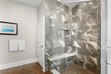 Penthouse chic welcomes you in this elegant, sparkling top floor