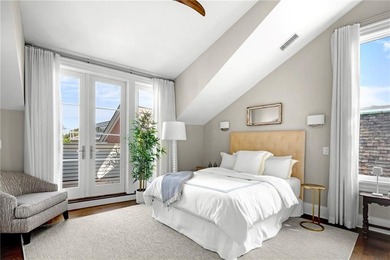 Penthouse chic welcomes you in this elegant, sparkling top floor