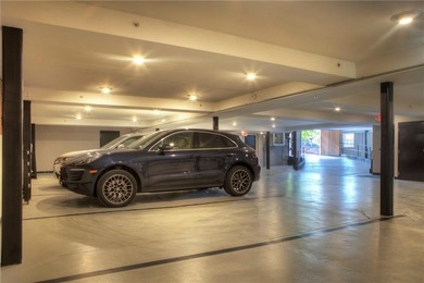 Penthouse chic welcomes you in this elegant, sparkling top floor