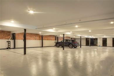 Penthouse chic welcomes you in this elegant, sparkling top floor