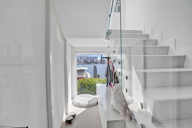 Introducing a spectacular, renovated 2BD+Den/3BA townhome at 400