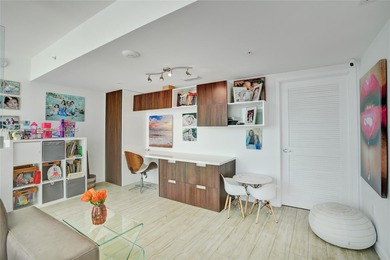 Introducing a spectacular, renovated 2BD+Den/3BA townhome at 400
